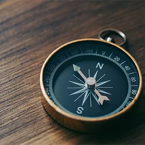 High angle view of a compass on a table